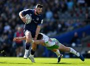 5 April 2025; Robbie Henshaw of Leinster is tackled by Ben Waghorn of Harlequins during the Investec Champions Cup Round of 16 match between Leinster and Harlequins at Croke Park in Dublin. Photo by Brendan Moran/Sportsfile