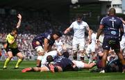6 April 2025; Tom O'Toole of Ulster scores his side's first try despite the tackle of Ben Tameifuna of Bordeaux Begles during the Investec Champions Cup Round of 16 match between Bordeaux Begles and Ulster at Stade Chaban-Delmas in Bordeaux, France. Photo by Ramsey Cardy/Sportsfile