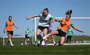 6 April 2025; Aoibheann Clancy is tackled by Heather Payne during a Republic of Ireland women's training session at the FAI National Training Centre in Abbotstown, Dublin. Photo by Stephen McCarthy/Sportsfile
