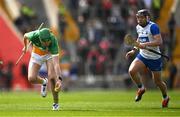 6 April 2025; Brian Duignan of Offaly gathers possession of the sliotar ahead of Darragh Lyons of Waterford during the Allianz Hurling League Division 1B final match between Waterford and Offaly at SuperValu Páirc Uí Chaoimh in Cork. Photo by Brendan Moran/Sportsfile
