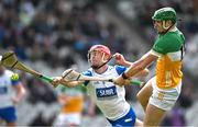 6 April 2025; Brian Duignan of Offaly has a shot on goal despite the efforts of Tadhg De Búrca of Waterford  during the Allianz Hurling League Division 1B final match between Waterford and Offaly at SuperValu Páirc Uí Chaoimh in Cork. Photo by Brendan Moran/Sportsfile