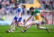 6 April 2025; Darragh Lyons of Waterford  in action against Cathal King of Offaly during the Allianz Hurling League Division 1B final match between Waterford and Offaly at SuperValu Páirc Uí Chaoimh in Cork. Photo by Piaras Ó Mídheach/Sportsfile