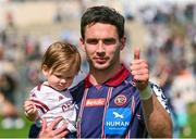 6 April 2025; Joey Carbery of Bordeaux Begles, with his son Beau, after the Investec Champions Cup Round of 16 match between Bordeaux Begles and Ulster at Stade Chaban-Delmas in Bordeaux, France. Photo by Ramsey Cardy/Sportsfile
