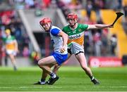 6 April 2025; Tadhg De Búrca of Waterford  gets his hurl caught in the shorts of Charlie Mitchell of Offaly during the Allianz Hurling League Division 1B final match between Waterford and Offaly at SuperValu Páirc Uí Chaoimh in Cork. Photo by Piaras Ó Mídheach/Sportsfile