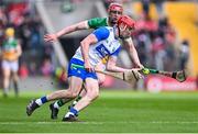6 April 2025; Tadhg De Búrca of Waterford in action against Charlie Mitchell of Offaly during the Allianz Hurling League Division 1B final match between Waterford and Offaly at SuperValu Páirc Uí Chaoimh in Cork. Photo by Piaras Ó Mídheach/Sportsfile