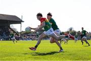 6 April 2025; Conor Crowley of Carlow in action against Seamus Lavin of Meath during the Leinster GAA Football Senior Championship round one match between Meath and Carlow at Pairc Tailteann in Navan, Meath. Photo by Thomas Flinkow/Sportsfile