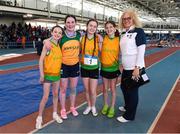 5 April 2025; The Annalee A.C. Cavan under-13 girls relay team, from left, Annabell Mc Donagh, Amelia Keegan, Ciara Gallagher and Marianna Osojca during day three of the 123.ie National Indoor Juvenile Championships at the TUS Indoor Arena in Athlone, Westmeath. Photo by Matt Browne/Sportsfile