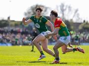 6 April 2025; Conor Crowley of Carlow in action against Seamus Lavin of Meath during the Leinster GAA Football Senior Championship round one match between Meath and Carlow at Pairc Tailteann in Navan, Meath. Photo by Thomas Flinkow/Sportsfile