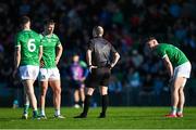 5 April 2025; Limerick captain Cillian Fahy in conversation with referee Derek O'Mahoney during the Munster GAA Football Senior Championship quarter-final match between Limerick and Cork at TUS Gaelic Grounds in Limerick. Photo by Tom Beary/Sportsfile