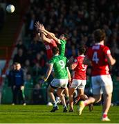 5 April 2025; Brian O'Driscoll of Cork in action against Emmet Rigter of Limerick during the Munster GAA Football Senior Championship quarter-final match between Limerick and Cork at TUS Gaelic Grounds in Limerick. Photo by Tom Beary/Sportsfile