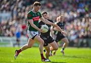 6 April 2025; Matthew Ruane of Mayo in action against Nathan Mullen of Sligo during the Connacht GAA Football Senior Championship quarter-final match between Mayo and Sligo at Hastings Insurance MacHale Park in Castlebar, Mayo. Photo by Sam Barnes/Sportsfile