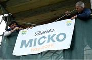 6 April 2025; Stewards hang up a poster in honour of late Kerry manager and footballer Mick O'Dwyer before the Connacht GAA Football Senior Championship quarter-final match between New York and Galway at Gaelic Park in New York, USA. Photo by Shauna Clinton/Sportsfile