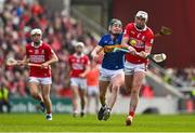 6 April 2025; Tim O'Mahony of Cork in action against Darragh Stakelum of Tipperary during the Allianz Hurling League Division 1A final match between Tipperary and Cork at SuperValu Páirc Uí Chaoimh in Cork. Photo by Brendan Moran/Sportsfile