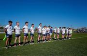 6 April 2025; The Wicklow players stand to honour the late Mick O'Dwyer before the Leinster GAA Football Senior Championship round one match between Longford and Wicklow at Glennon Brothers Pearse Park in Longford. Photo by Ray McManus/Sportsfile