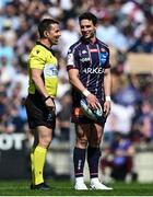 6 April 2025; Joey Carbery of Bordeaux Begles shares a joke with referee Luke Pearce before the Investec Champions Cup Round of 16 match between Bordeaux Begles and Ulster at Stade Chaban-Delmas in Bordeaux, France. Photo by Ramsey Cardy/Sportsfile