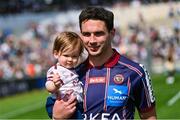6 April 2025; Joey Carbery of Bordeaux Begles with his son Beau after the Investec Champions Cup Round of 16 match between Bordeaux Begles and Ulster at Stade Chaban-Delmas in Bordeaux, France. Photo by Ramsey Cardy/Sportsfile