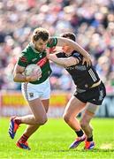 6 April 2025; Aidan O'Shea of Mayo in action against Eddie McGuinness of Sligo during the Connacht GAA Football Senior Championship quarter-final match between Mayo and Sligo at Hastings Insurance MacHale Park in Castlebar, Mayo. Photo by Sam Barnes/Sportsfile