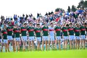 6 April 2025; The Mayo team stand for a moments silence in memory of the late Mick O'Dwyer before the Connacht GAA Football Senior Championship quarter-final match between Mayo and Sligo at Hastings Insurance MacHale Park in Castlebar, Mayo. Photo by Sam Barnes/Sportsfile