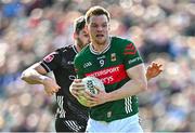 6 April 2025; Matthew Ruane of Mayo in action against Nathan Mullen of Sligo during the Connacht GAA Football Senior Championship quarter-final match between Mayo and Sligo at Hastings Insurance MacHale Park in Castlebar, Mayo. Photo by Sam Barnes/Sportsfile