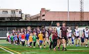6 April 2025; Galway players, including captain Seán Kelly, right, walk in the parade before the Connacht GAA Football Senior Championship quarter-final match between New York and Galway at Gaelic Park in New York, USA. Photo by Shauna Clinton/Sportsfile