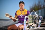7 April 2025; Wexford hurler Lee Chin poses for a portrait with the Bob O'Keeffe Cup at the launch of the 2025 Leinster GAA Senior Hurling Championship at UPMC Nowlan Park in Kilkenny. Photo by Sam Barnes/Sportsfile