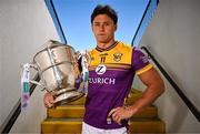 7 April 2025; Wexford hurler Lee Chin poses for a portrait with the Bob O'Keeffe Cup at the launch of the 2025 Leinster GAA Senior Hurling Championship at UPMC Nowlan Park in Kilkenny. Photo by Sam Barnes/Sportsfile