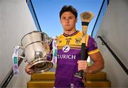 7 April 2025; Wexford hurler Lee Chin poses for a portrait with the Bob O'Keeffe Cup at the launch of the 2025 Leinster GAA Senior Hurling Championship at UPMC Nowlan Park in Kilkenny. Photo by Sam Barnes/Sportsfile