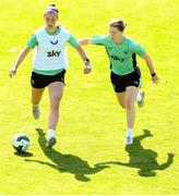 7 April 2025; Caitlin Hayes and Emily Murphy, right, during a Republic of Ireland women's training session at Tallaght Stadium in Dublin. Photo by Stephen McCarthy/Sportsfile