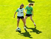 7 April 2025; Caitlin Hayes and Aoibheann Clancy, right, during a Republic of Ireland women's training session at Tallaght Stadium in Dublin. Photo by Stephen McCarthy/Sportsfile
