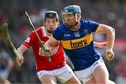 6 April 2025; Jason Forde of Tipperary in action against Eoin Downey of Cork during the Allianz Hurling League Division 1A final match between Tipperary and Cork at SuperValu Páirc Uí Chaoimh in Cork. Photo by Brendan Moran/Sportsfile