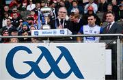 6 April 2025; Uachtarán Chumann Lúthchleas Gael Jarlath Burns, left, makes a speech in the company of Waterford captain Dessie Hutchinson and Allianz chief executive Geoff Sparling, after the Allianz Hurling League Division 1B final match between Waterford and Offaly at SuperValu Páirc Uí Chaoimh in Cork. Photo by Brendan Moran/Sportsfile