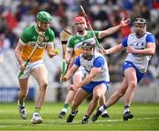 6 April 2025; Brian Duignan of Offaly in action against Ian Kenny of Waterford  during the Allianz Hurling League Division 1B final match between Waterford and Offaly at SuperValu Páirc Uí Chaoimh in Cork. Photo by Piaras Ó Mídheach/Sportsfile