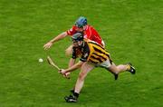 12 September 2004; Ken Coogan, Kilkenny, in action against Tom Kenny, Cork. Guinness All-Ireland Senior Hurling Championship Final, Cork v Kilkenny, Croke Park, Dublin. Picture credit; Pat Murphy / SPORTSFILE *** Local Caption *** Any photograph taken by SPORTSFILE during, or in connection with, the 2004 Guinness All-Ireland Hurling Final which displays GAA logos or contains an image or part of an image of any GAA intellectual property, or, which contains images of a GAA player/players in their playing uniforms, may only be used for editorial and non-advertising purposes.  Use of photographs for advertising, as posters or for purchase separately is strictly prohibited unless prior written approval has been obtained from the Gaelic Athletic Association.