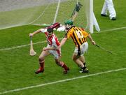 12 September 2004; Donal Og Cusack, Cork goalkeeper, in action against Henry Shefflin, Kilkenny. Guinness All-Ireland Senior Hurling Championship Final, Cork v Kilkenny, Croke Park, Dublin. Picture credit; Pat Murphy / SPORTSFILE *** Local Caption *** Any photograph taken by SPORTSFILE during, or in connection with, the 2004 Guinness All-Ireland Hurling Final which displays GAA logos or contains an image or part of an image of any GAA intellectual property, or, which contains images of a GAA player/players in their playing uniforms, may only be used for editorial and non-advertising purposes.  Use of photographs for advertising, as posters or for purchase separately is strictly prohibited unless prior written approval has been obtained from the Gaelic Athletic Association.