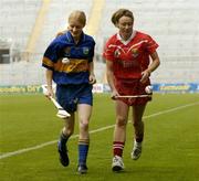 14 September 2004; Camogie senior Captains, Stephanie Dunlea, Cork, right, with Joanne Ryan, Tipperary, at a photocall in Croke Park before Sunday's All Ireland Camogie Junior and Senior Finals in Croke Park. Dublin. Picture credit; David Maher / SPORTSFILE