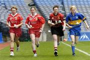 14 September 2004; Camogie Captains from left to right, Stephanie Dunlea, Cork Senior, Val O\Keeffe, Cork Junior, Jennifer Braniff, Down Junior and Joanne Ryan, Tipperary Senior, at a photocall in Croke Park before Sunday's All Ireland Camogie Junior and Senior Finals in Croke Park. Dublin. Picture credit; David Maher / SPORTSFILE