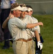 14 September 2004; Darren Clarke, left, and Ian Poulter, Team Europe 2004, pictured at the driving range in advance of the 35th Ryder Cup Matches. Oakland Hills Country Club, Bloomfield Township, Michigan, USA. Picture credit; Matt Browne / SPORTSFILE