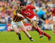 12 September 2004; Sean Og O'hAilpin, Cork, in action against Henry Shefflin, Kilkenny. Guinness All-Ireland Senior Hurling Championship Final, Cork v Kilkenny, Croke Park, Dublin. Picture credit; Damien Eagers / SPORTSFILE *** Local Caption *** Any photograph taken by SPORTSFILE during, or in connection with, the 2004 Guinness All-Ireland Hurling Final which displays GAA logos or contains an image or part of an image of any GAA intellectual property, or, which contains images of a GAA player/players in their playing uniforms, may only be used for editorial and non-advertising purposes.  Use of photographs for advertising, as posters or for purchase separately is strictly prohibited unless prior written approval has been obtained from the Gaelic Athletic Association.