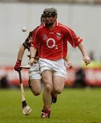 12 September 2004; Wayne Sherlock, Cork, in action against Kilkenny. Guinness All-Ireland Senior Hurling Championship Final, Cork v Kilkenny, Croke Park, Dublin. Picture credit; Damien Eagers / SPORTSFILE *** Local Caption *** Any photograph taken by SPORTSFILE during, or in connection with, the 2004 Guinness All-Ireland Hurling Final which displays GAA logos or contains an image or part of an image of any GAA intellectual property, or, which contains images of a GAA player/players in their playing uniforms, may only be used for editorial and non-advertising purposes.  Use of photographs for advertising, as posters or for purchase separately is strictly prohibited unless prior written approval has been obtained from the Gaelic Athletic Association.