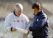 15 September 2004; Shelbourne manager Pat Fenlon speaks with Assistant manager Eamon Collins, left, during squad training ahead of their UEFA Cup, 1st Round - 1st Leg match against Lille. Lansdowne Road, Dublin. Picture credit; Brian Lawless / SPORTSFILE