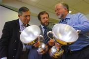 15 September 2004; Sean Kelly, President of the GAA, and Liam Mulvihill, Ard Stuirthoir of the GAA, left, take close look at the M Donnelly Interprovincial Championship trophies, with Martin Donnelly, of M Donnelly & Co. sponsors of the Interprovincial championships, right, after a press conference to confirm the dates and venues for the forthcoming M Donnelly Interprovincial championships in both football and hurling. Croke Park, Dublin. Picture credit; Pat Murphy / SPORTSFILE