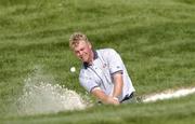 15 September 2004; Darren Clarke, Team Europe 2004, plays from the bunker onto the 17th green during the practice round in advance of the 35th Ryder Cup Matches. Oakland Hills Country Club, Bloomfield Township, Michigan, USA. Picture credit; Matt Browne / SPORTSFILE