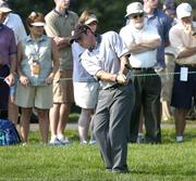 15 September 2004; Paul McGinley, Team Europe 2004, pitches onto the 10th green during the practice round in advance of the 35th Ryder Cup Matches. Oakland Hills Country Club, Bloomfield Township, Michigan, USA. Picture credit; Matt Browne / SPORTSFILE