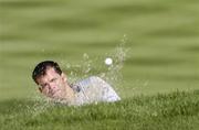 15 September 2004; Paul Casey, Team Europe 2004, chips from the bunker onto the 12th green during the practice round in advance of the 35th Ryder Cup Matches. Oakland Hills Country Club, Bloomfield Township, Michigan, USA. Picture credit; Matt Browne / SPORTSFILE
