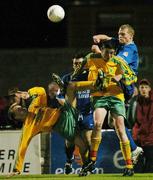 15 September 2004; Edwin Buckley, left, and Shane Hennessey, Rockmount, in action against John Frost and Ben Whelehan, right, Waterford United. FAI Cup Quarter Final Replay, Rockmount v Waterford United, Turners Cross, Cork. Picture credit; David Maher / SPORTSFILE