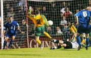 15 September 2004; John Busteed, no.2, Rockmount, beats Waterford United goalkeeper Danny Connor to score his side's equalising goal. FAI Cup Quarter Final Replay, Rockmount v Waterford United, Turners Cross, Cork. Picture credit; David Maher / SPORTSFILE