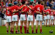 12 September 2004; Cork players stand for the National Anthem. Guinness All-Ireland Senior Hurling Championship Final, Cork v Kilkenny, Croke Park, Dublin. Picture credit; Brian Lawless / SPORTSFILE *** Local Caption *** Any photograph taken by SPORTSFILE during, or in connection with, the 2004 Guinness All-Ireland Hurling Final which displays GAA logos or contains an image or part of an image of any GAA intellectual property, or, which contains images of a GAA player/players in their playing uniforms, may only be used for editorial and non-advertising purposes.  Use of photographs for advertising, as posters or for purchase separately is strictly prohibited unless prior written approval has been obtained from the Gaelic Athletic Association.