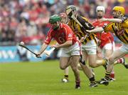 12 September 2004; Jerry O'Connor, Cork, in action against Ken Coogan and James 'Cha' Fitzpatrick, right, Kilkenny. Guinness All-Ireland Senior Hurling Championship Final, Cork v Kilkenny, Croke Park, Dublin. Picture credit; Damien Eagers / SPORTSFILE *** Local Caption *** Any photograph taken by SPORTSFILE during, or in connection with, the 2004 Guinness All-Ireland Hurling Final which displays GAA logos or contains an image or part of an image of any GAA intellectual property, or, which contains images of a GAA player/players in their playing uniforms, may only be used for editorial and non-advertising purposes.  Use of photographs for advertising, as posters or for purchase separately is strictly prohibited unless prior written approval has been obtained from the Gaelic Athletic Association.