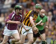 12 September 2004; Kevin Hynes, Galway, in action against Ronan Maher, Kilkenny. All-Ireland Minor Hurling Championship Final, Galway v Kilkenny, Croke Park, Dublin. Picture credit; Ray McManus / SPORTSFILE *** Local Caption *** Any photograph taken by SPORTSFILE during, or in connection with, the 2004 Guinness All-Ireland Hurling Final which displays GAA logos or contains an image or part of an image of any GAA intellectual property, or, which contains images of a GAA player/players in their playing uniforms, may only be used for editorial and non-advertising purposes.  Use of photographs for advertising, as posters or for purchase separately is strictly prohibited unless prior written approval has been obtained from the Gaelic Athletic Association.