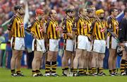 12 September 2004; The Kilkenny team stand for the National Anthem. Guinness All-Ireland Senior Hurling Championship Final, Cork v Kilkenny, Croke Park, Dublin. Picture credit; Ray McManus / SPORTSFILE *** Local Caption *** Any photograph taken by SPORTSFILE during, or in connection with, the 2004 Guinness All-Ireland Hurling Final which displays GAA logos or contains an image or part of an image of any GAA intellectual property, or, which contains images of a GAA player/players in their playing uniforms, may only be used for editorial and non-advertising purposes.  Use of photographs for advertising, as posters or for purchase separately is strictly prohibited unless prior written approval has been obtained from the Gaelic Athletic Association.